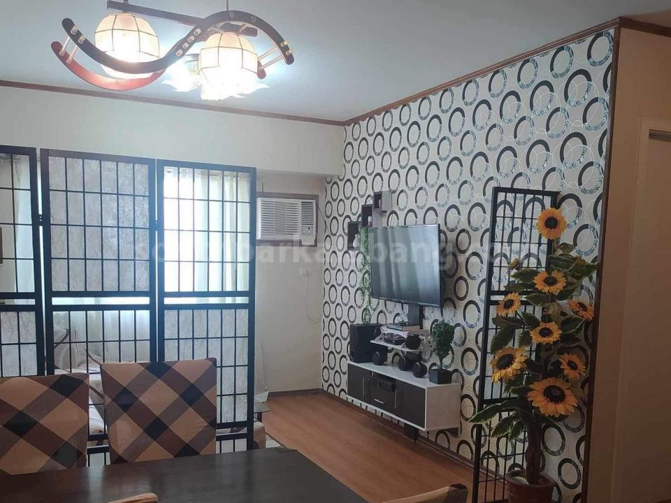 Dining and living areas of 1-bedroom condo unit at Avida Tower Altura tower 1 Dining and living areas of 1-bedroom condo unit at Avida Tower Altura tower 1